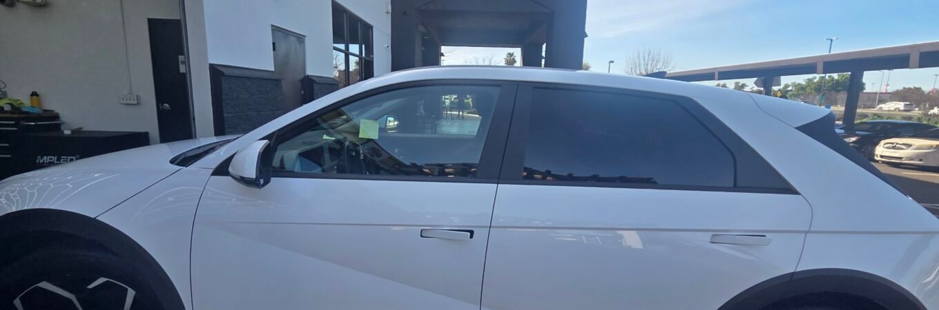 Lux Wash and Detail team caring for a vehicle in Elk Grove